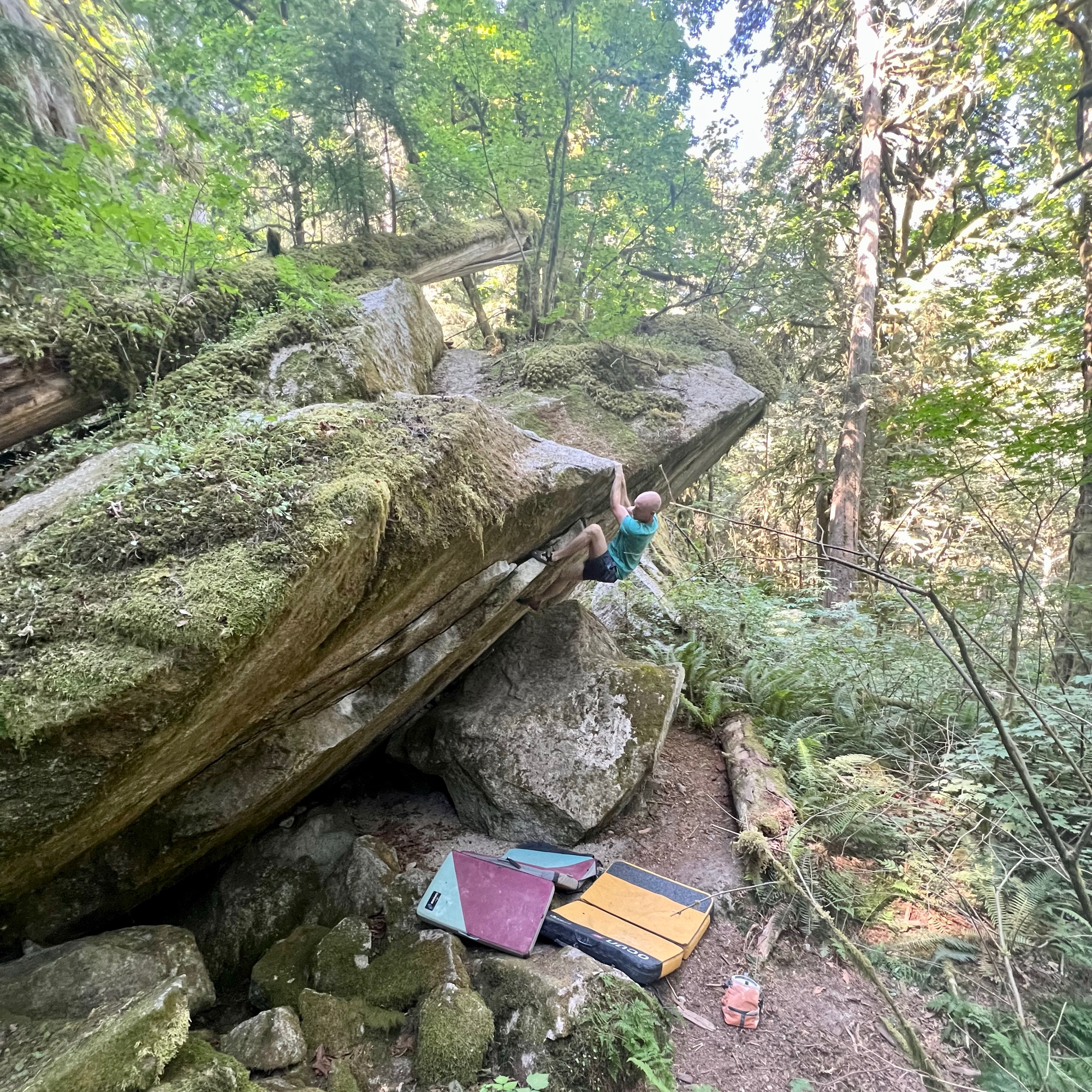 Climbing Beta video of climbers on Lost World Overhang v2 in Squamish with undefined beta videos in KAYA, the climber's app - where climbers can log and track their ascents, progress, and connect with their local gym and outdoor climbing community.